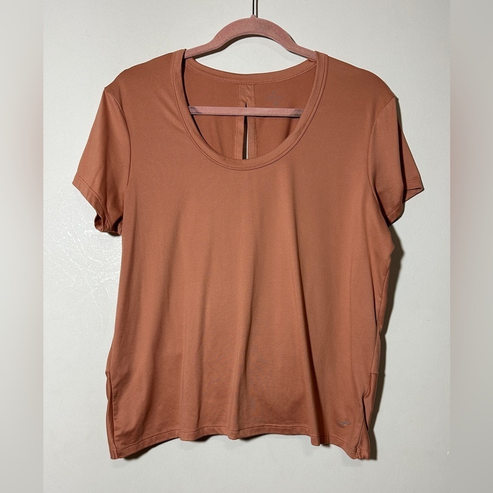 Freely athletic top with knot in the back Size XL